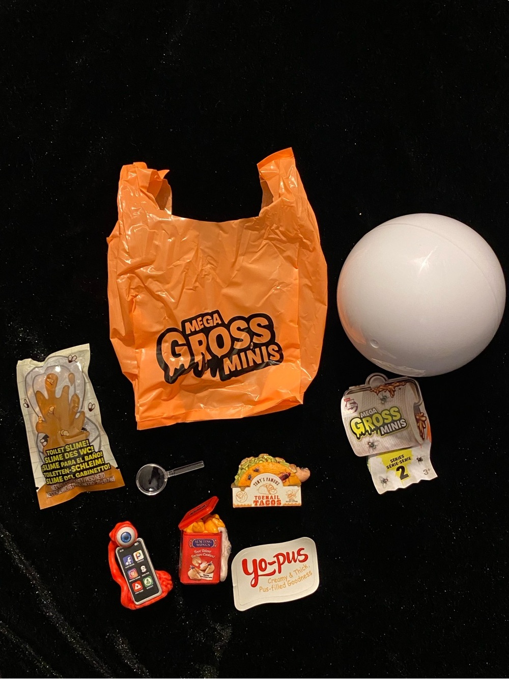 Mega Gross Minis Orange Surprise Bag with 8 Collectible Toys